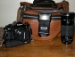 Canon A1 with lenses, winder, case, strap, flash