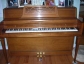 Cherry wood upright piano