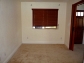 1 bedroom Apartment - Second floor corner unit features two assigned parking spaces.